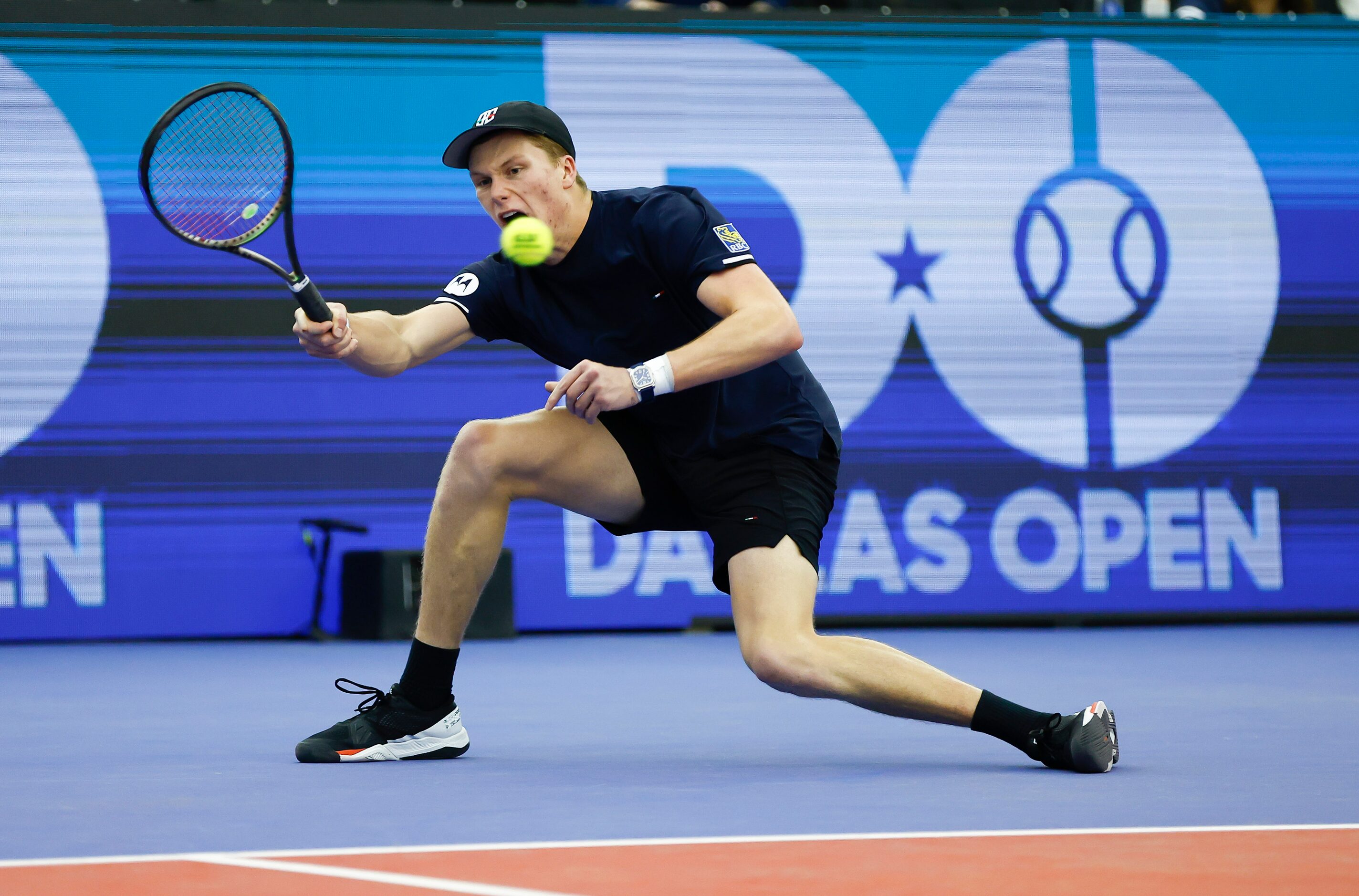 Jenson Brooksby returns the ball during the finals of the ATP Dallas Open against Reilly...