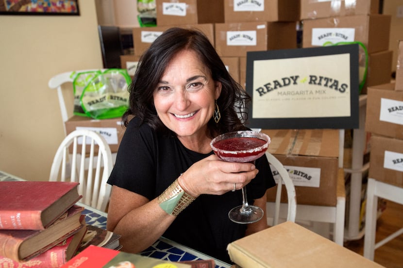 Kathy Thomas, executive vice president of Half Price Books and founder of Ready Ritas, poses...