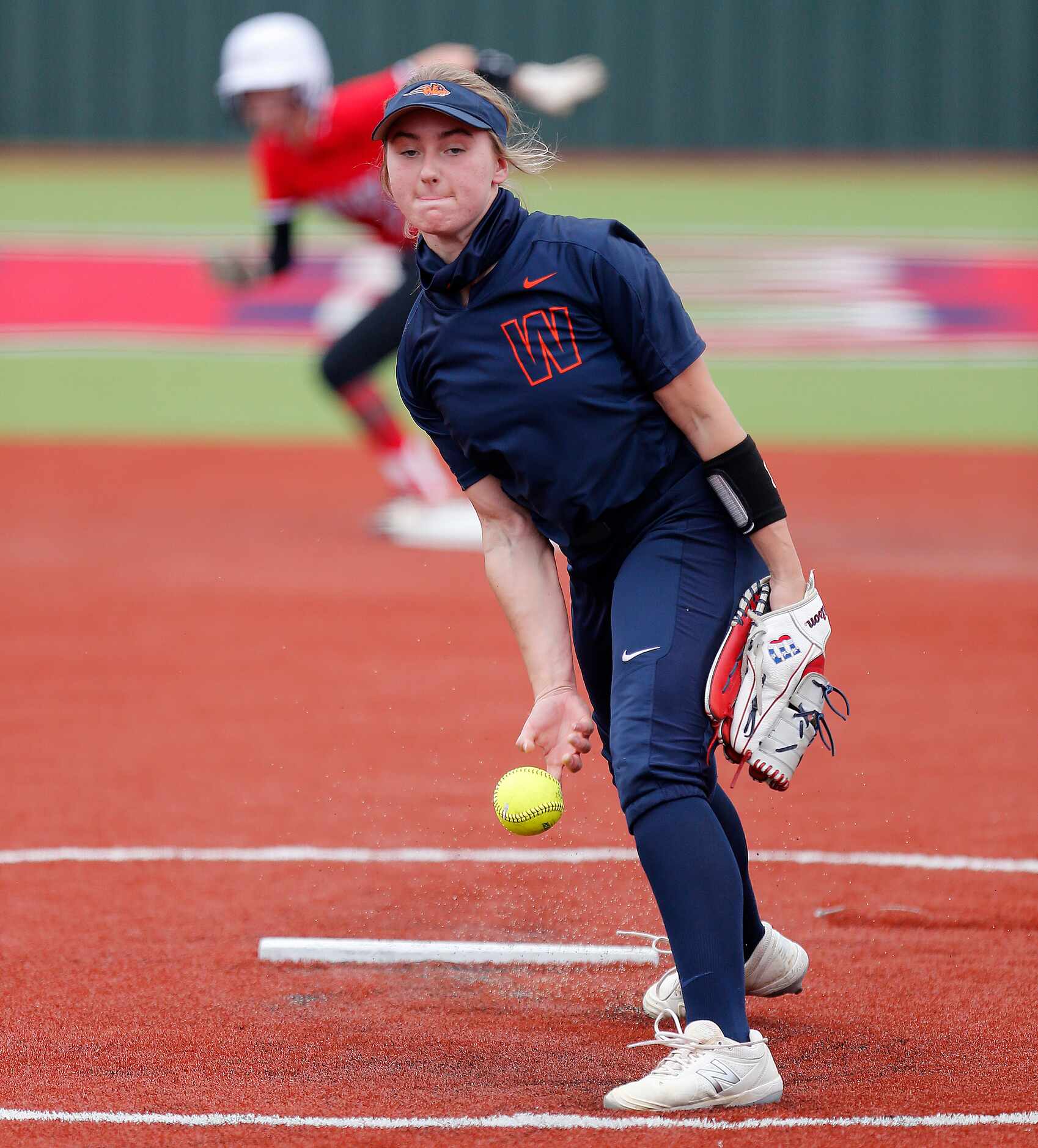 Wakeland pitcher Kate Piskor (15) delivers a pitch in the first inning as Lovejoy High...