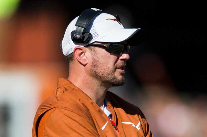 Texas Longhorns head coach Tom Herman watches from the sideline during the first quarter of...