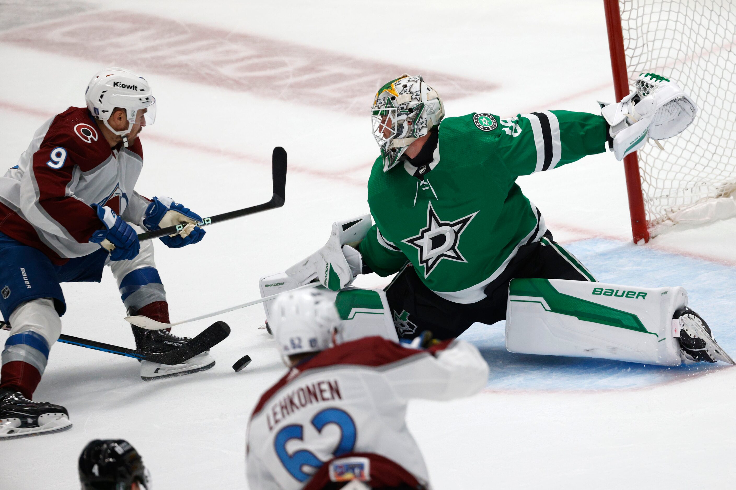 Dallas Stars goaltender Jake Oettinger (29) makes a save against Colorado Avalanche left...