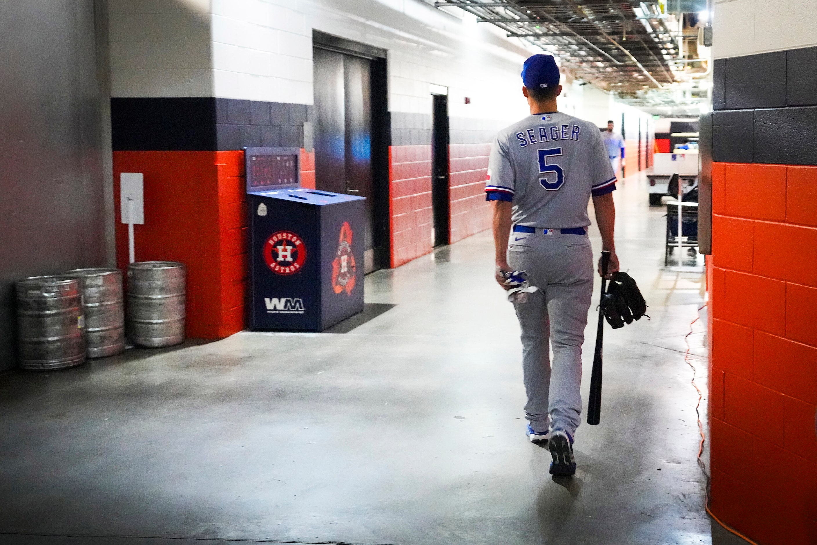 Texas Rangers shortstop Corey Seager heads for the team’s clubhouse prior to a workout in...