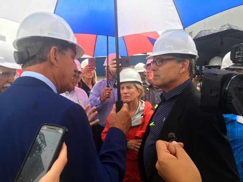 Energy Secretary Rick Perry (right) talked Thursday with Sen. Joe Manchin, D-W.Va., and Sen....