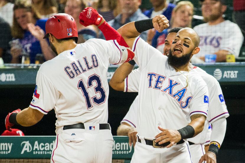 Texas Rangers third baseman Joey Gallo (13) celebrates with second baseman Rougned Odor (12)...