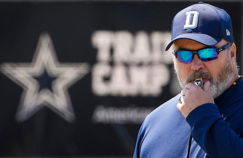 Dallas Cowboys head coach Mike McCarthy blows a whistle during a practice at training camp...