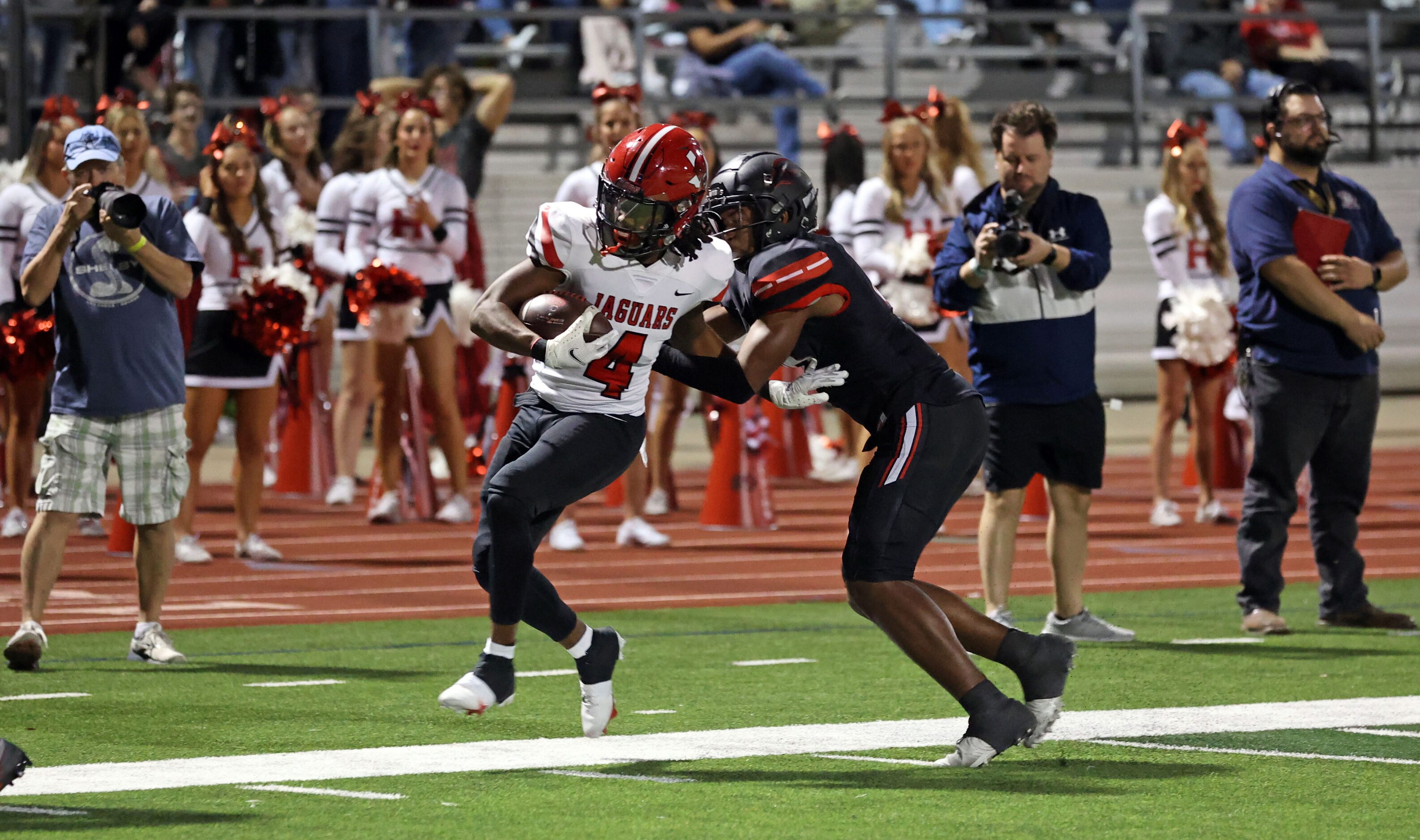 A Rockwall Heath defender forces Mesquite Horn’s Jeremiah Batiste (4) out of bounds during...