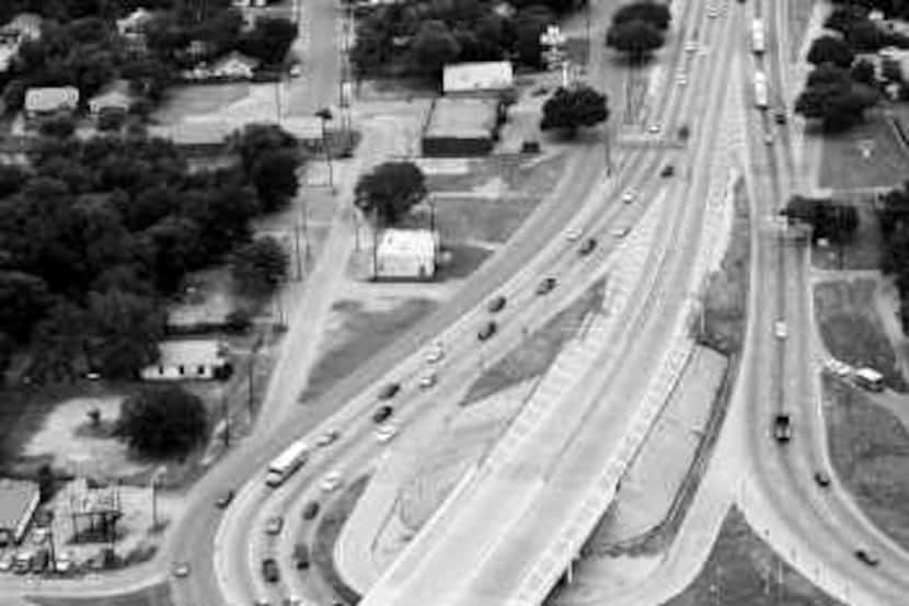  An aerial shot shows a portion of road known as 'Dead Man's Curve.' A freeway revamp could...
