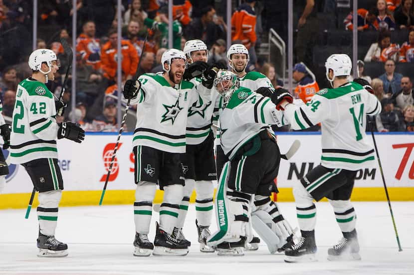 Dallas Stars celebrate a shootout win over the Edmonton Oilers in an NHL hockey game...