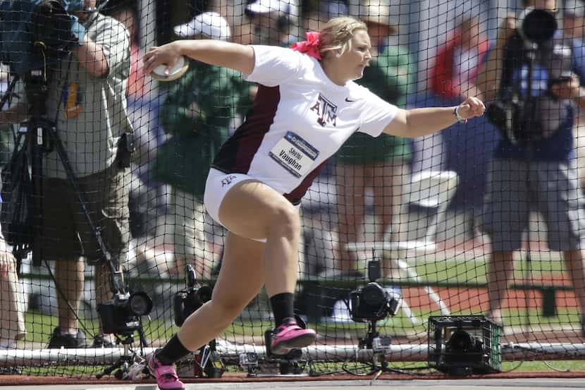 Texas A&M's Shelbi Vaughan throws during the women's discus at the NCAA track and field...