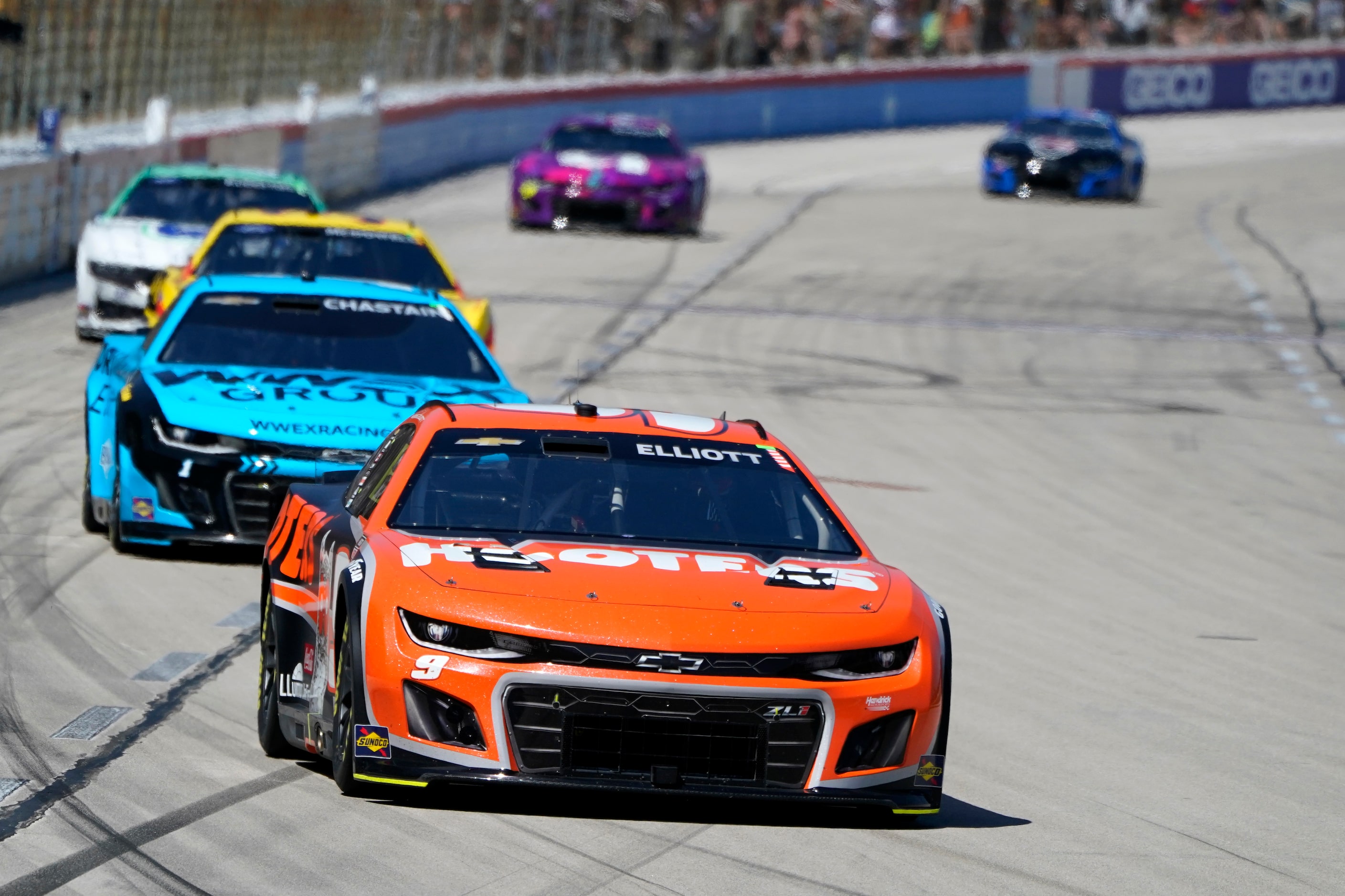 Chase Elliott (9) heads into Turn 1 during a NASCAR Cup Series auto race at Texas Motor...