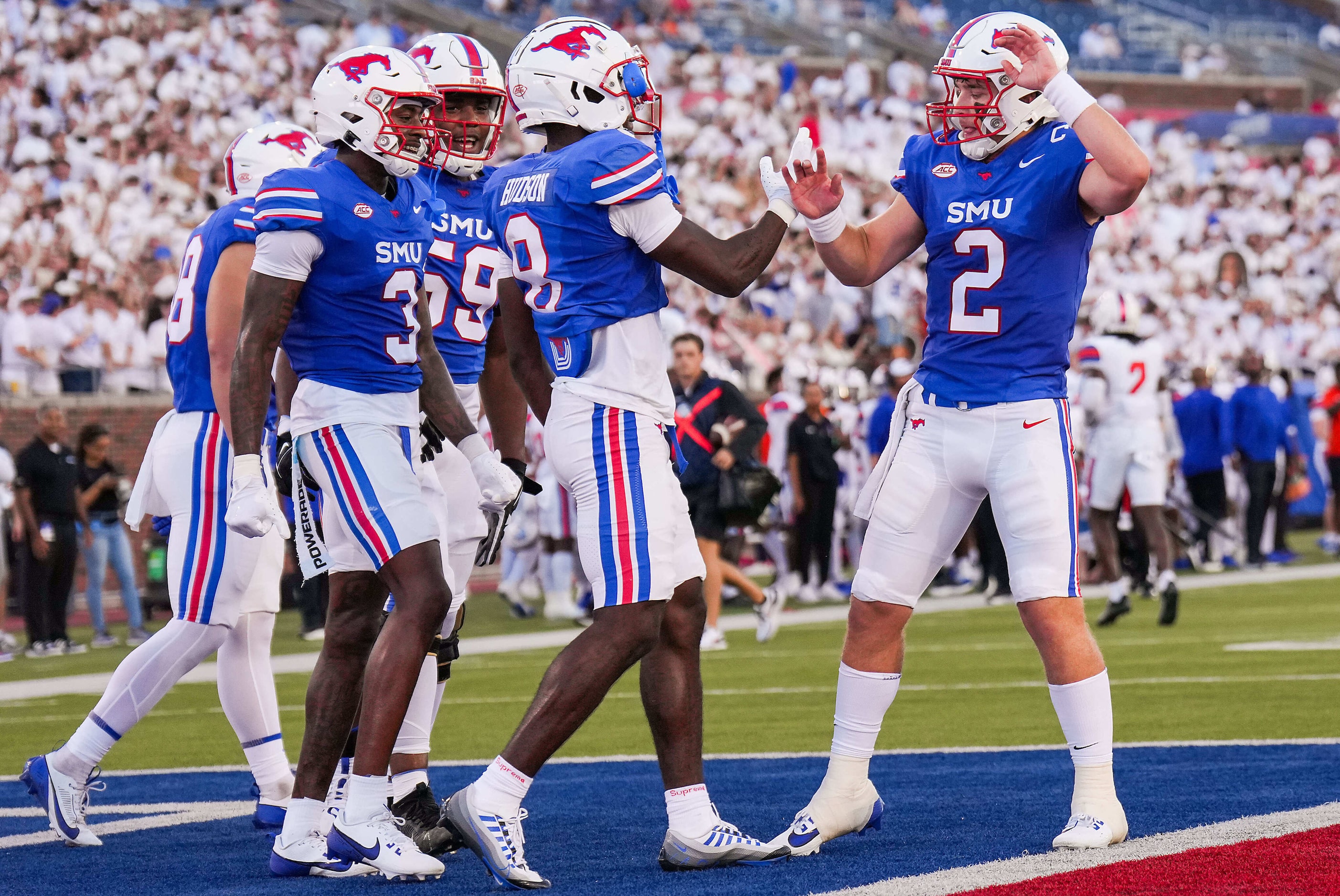 SMU wide receiver Jordan Hudson (8) celebrates with quarterback Preston Stone (2) after they...