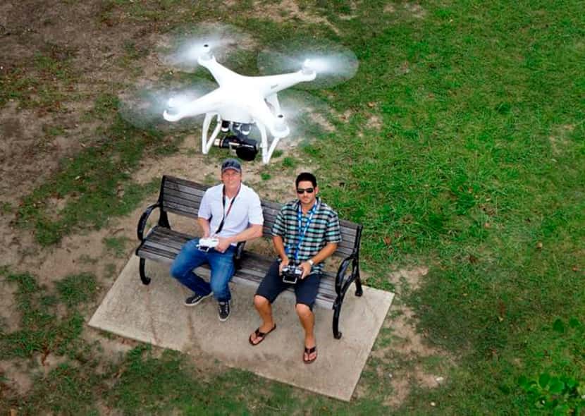 
W. Ross Cromartie (left) and Payne Wingate demonstrate the use of a drone at White Rock...