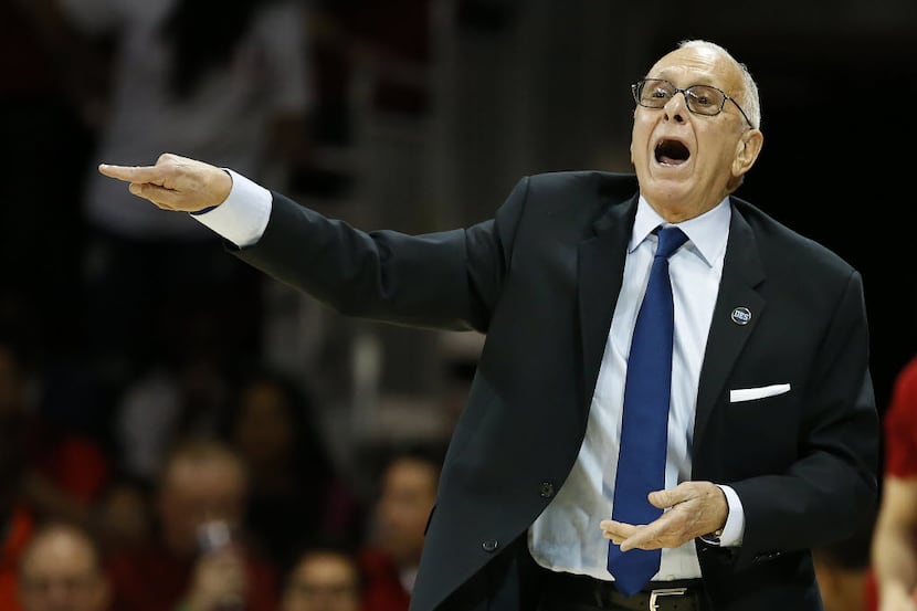 SMU head coach Larry Brown directs his team against Connecticut during the first half at...