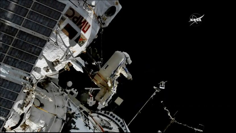 In this image made from a video, cosmonaut Sergey Prokopyev flings a Sirius nano-satellite...