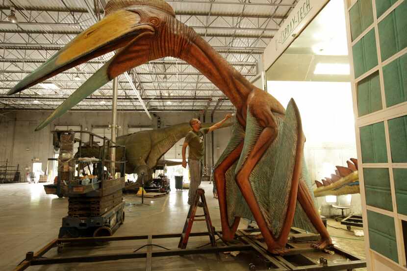 Antolin Pineda paints a quetzalcoatlus, an ancient bird-like animal, at Billings Productions...