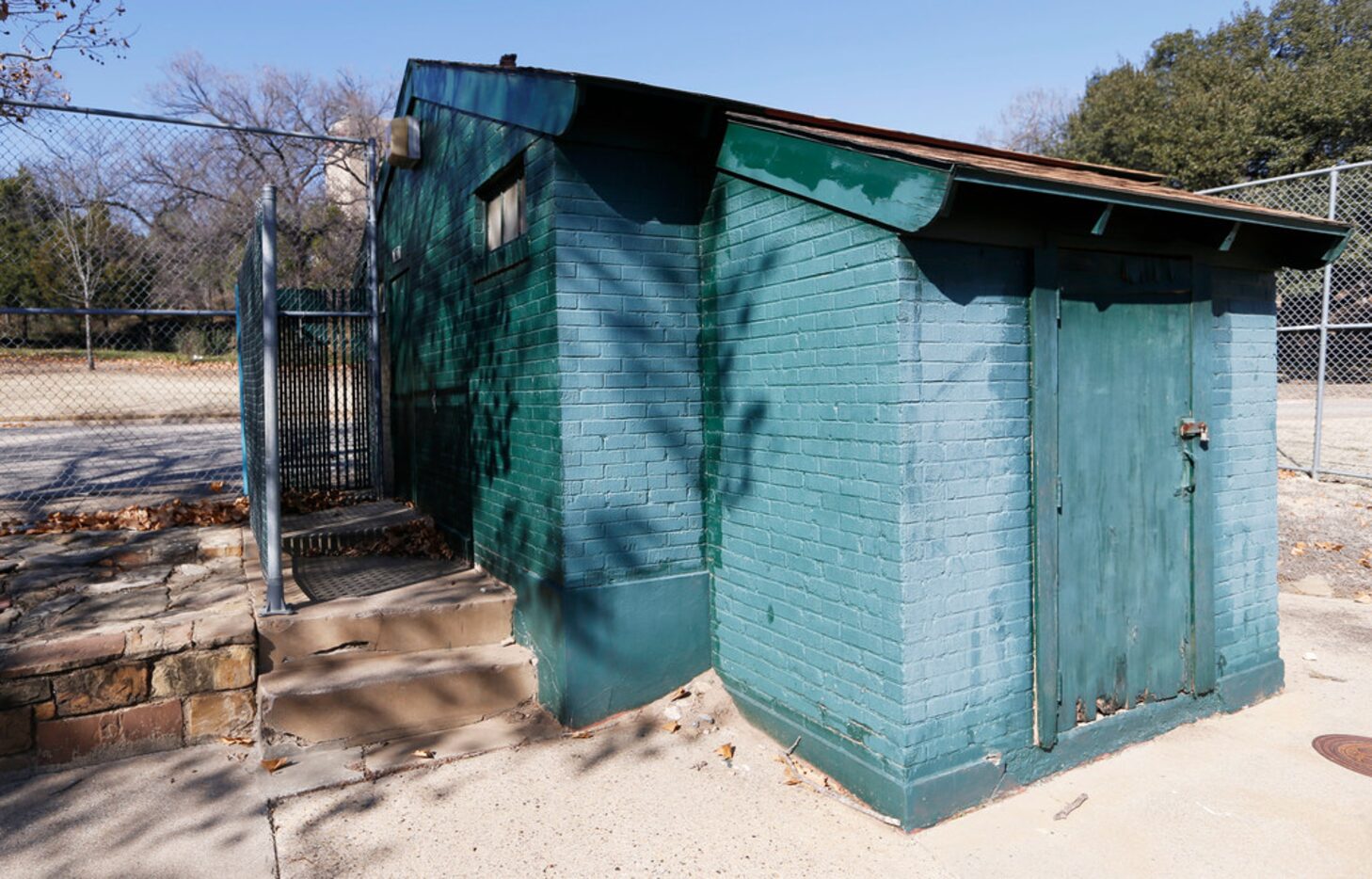 The bathrooms at the Reverchon Park ballpark aren't ADA-compliant. And they're also kind of...