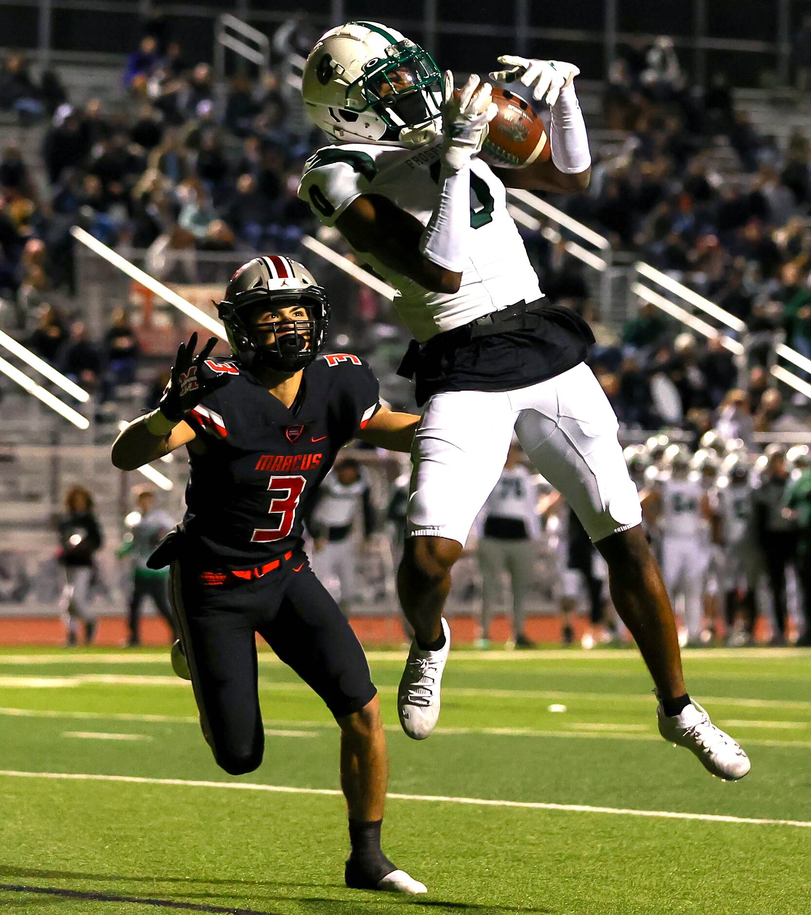Prosper wide receiver Tyler Bailey (0) comes up with a 13 yard touchdown reception against...