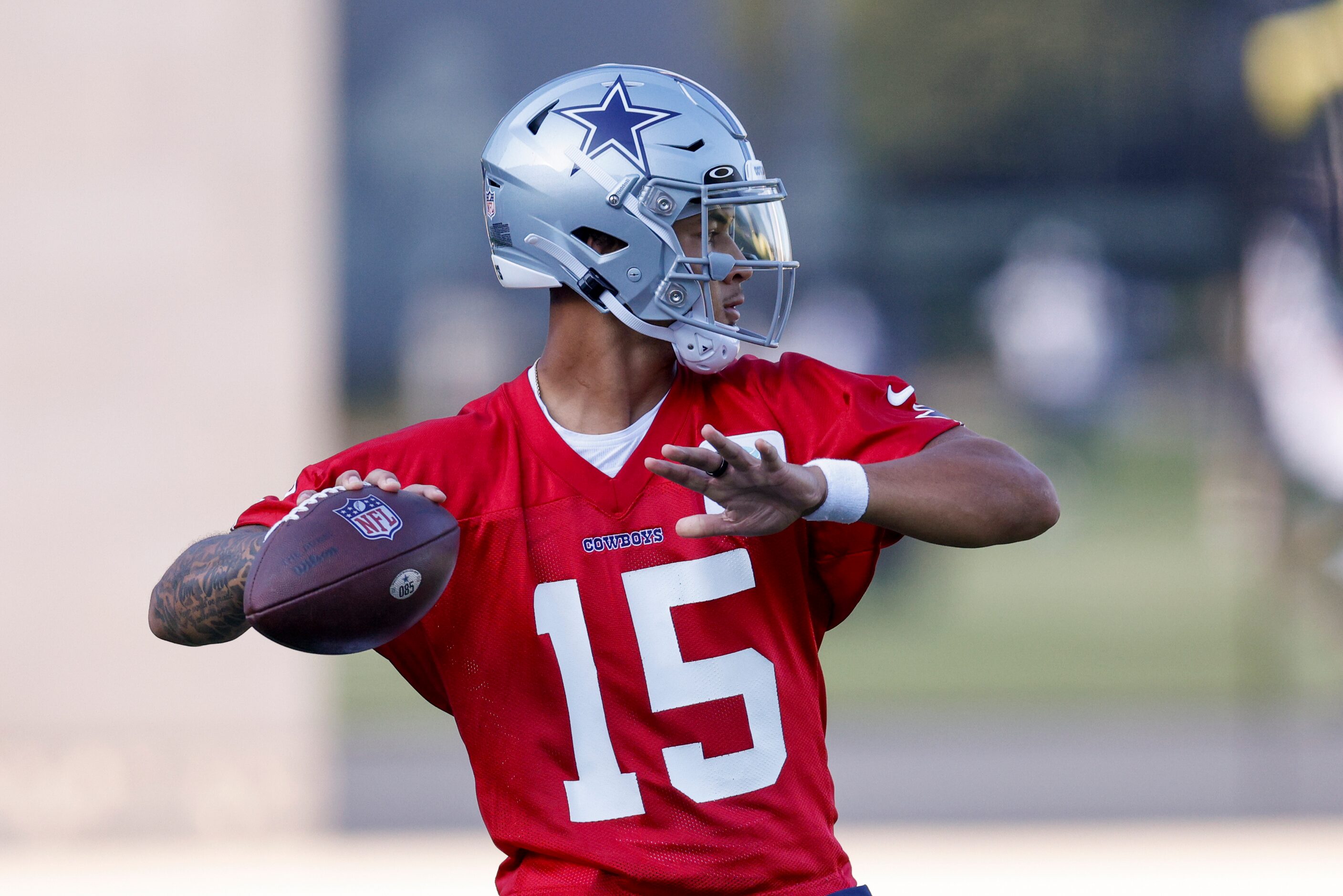 Dallas Cowboys quarterback Trey Lance (15) throws a pass during a practice at The Star,...