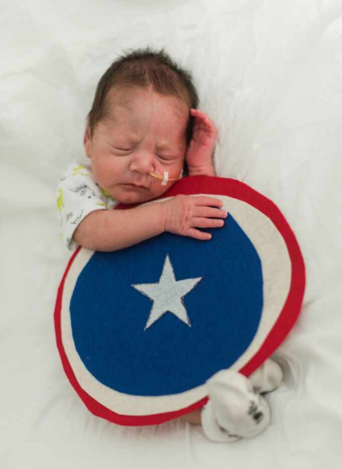 Infants in the Neonatal Intensive Care Unit at Methodist Dallas Medical Center dressed up...