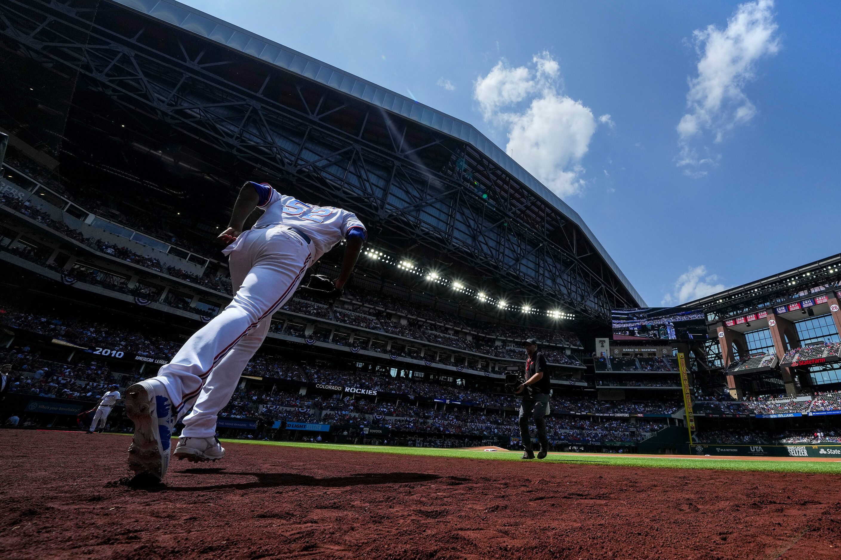 Texas Rangers pitcher Taylor Hearn takes the field before the Rangers home opener against...