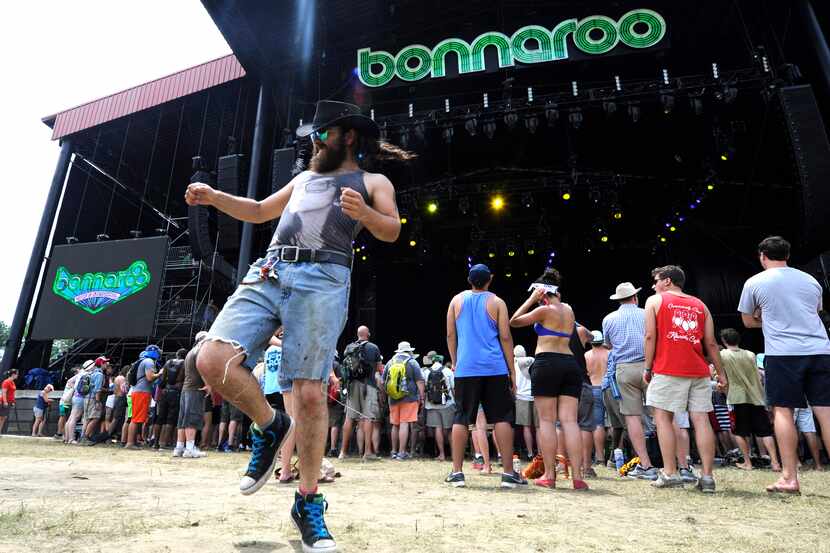 A fan dances to the music of the Carolina Chocolate Drops during the Bonnaroo Music & Arts...