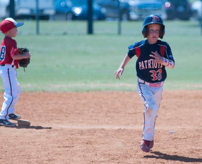 
Todd McHugh rounds the bases during Strikes Against Cancer. 
