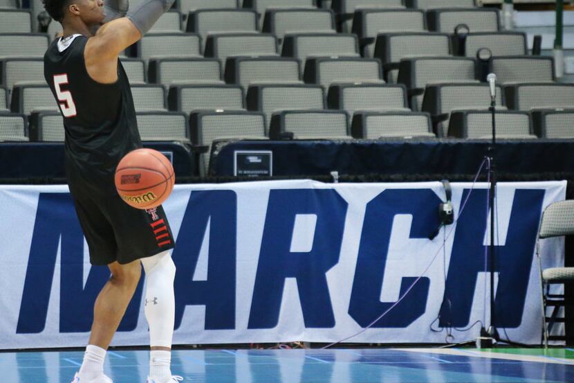 Texas Tech Red Raiders guard Justin Gray (5) puts up a shot during NCAA Tournament open...