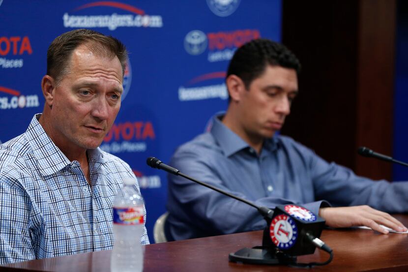 Texas Rangers Manager Jeff Banister (left) answers questions as President of Baseball...