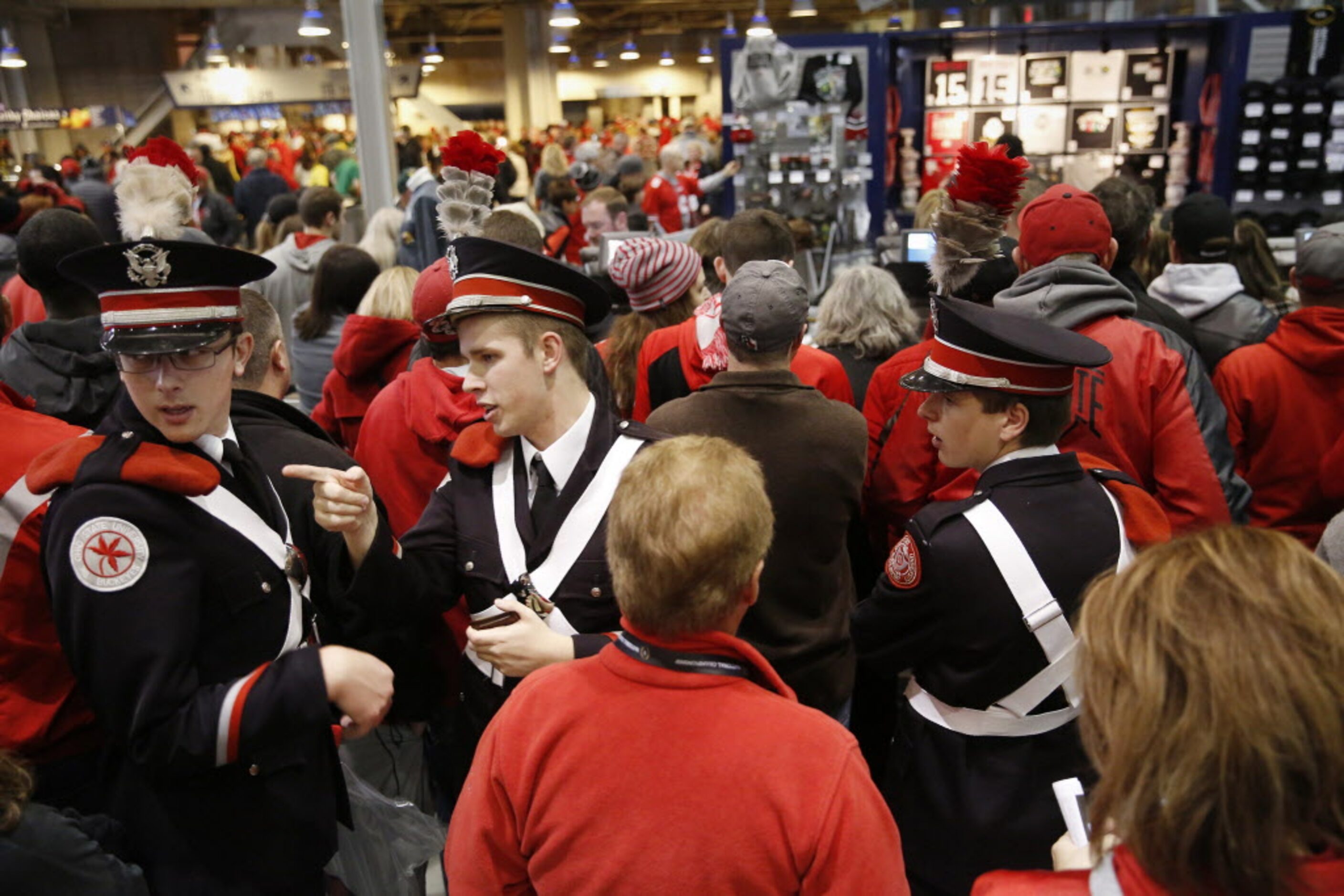 (From left) Ohio State Buckeyes marching band members Brad Thomas, Zach Maley and Nick...