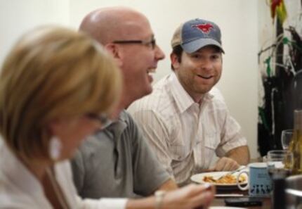  Jason Boso, far right, sits next to James Tidwell at a Dallas Morning News wine panel event...
