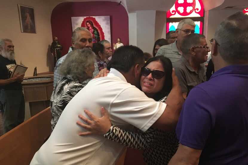 Hector Zamarripa, the uncle of slain Dallas police officer Patrick Zamarripa, hugged family...