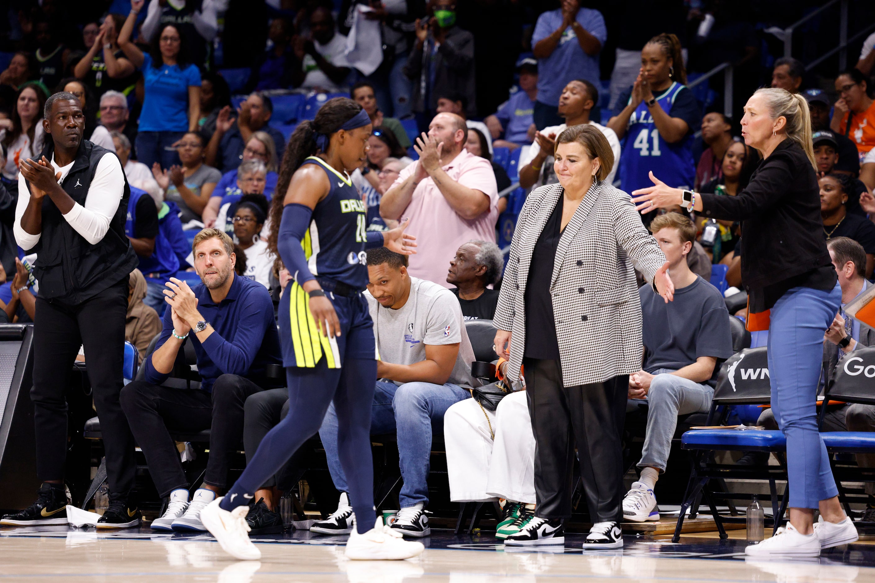 Mavericks assistant general manager Michael Finley (left) and Pro Basketball Hall of Famer...