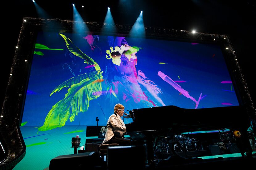 John plays "Bennie and the Jets" at American Airlines Center during his last visit in 2018.