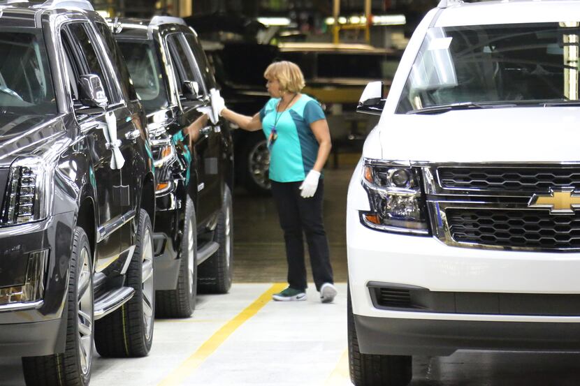 New vehicles are completed at the General Motors assembly plant in Arlington, Texas, shown...