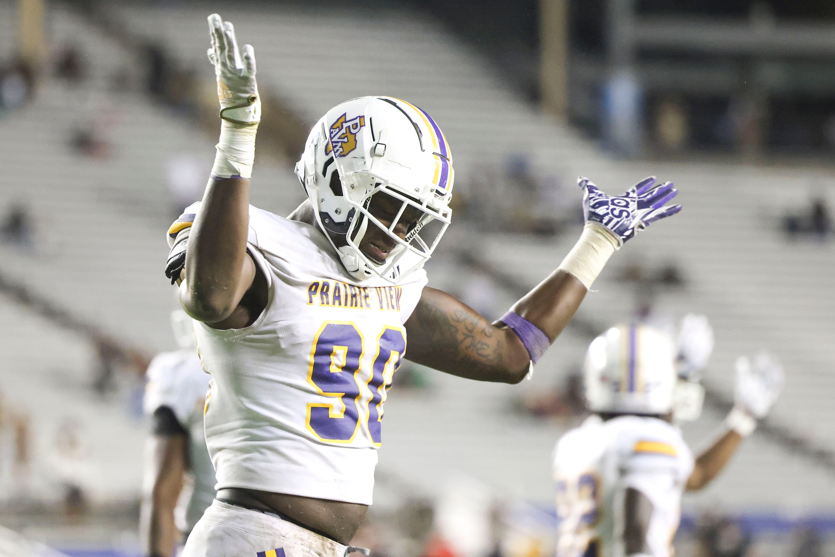 Prairie View A&M defensive end Fred Stokes Jr. hypes up the crowd during the overtime of...