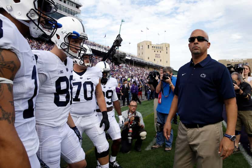 Penn State head coach James Franklin looks around before an NCAA college football game...