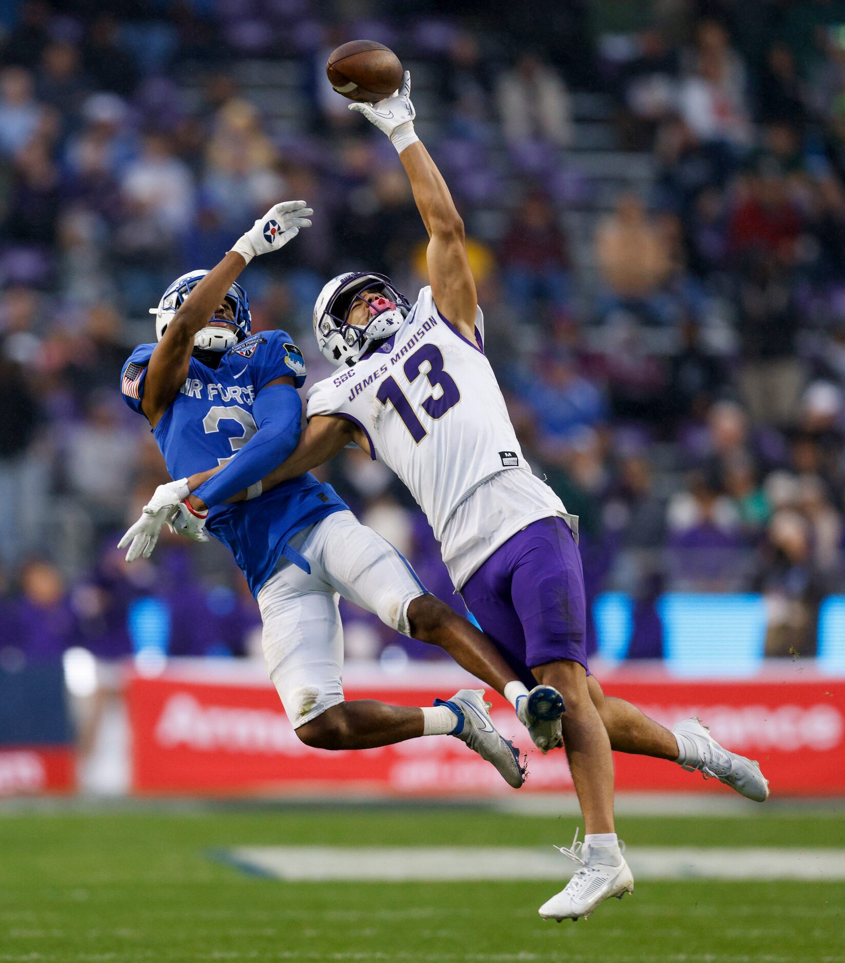 James Madison Dukes wide receiver Elijah Sarratt (13) fails to make a leaping catch against...