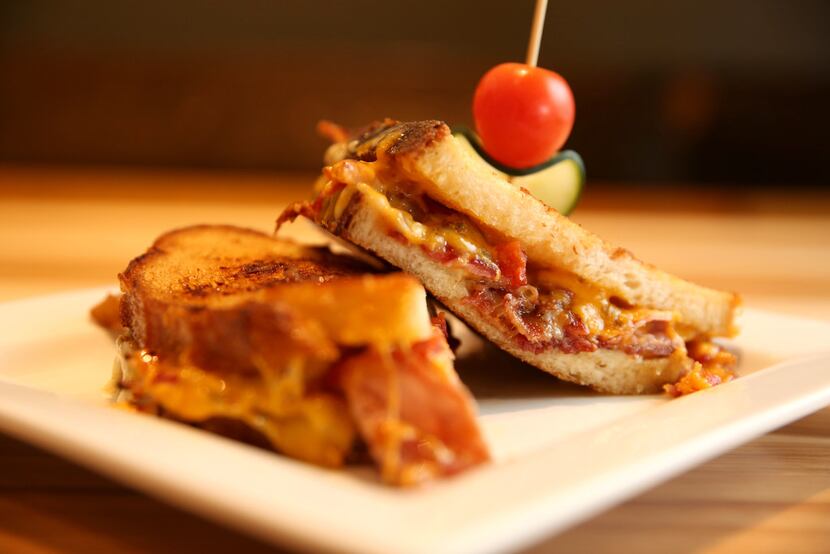 The spicy two-pork grilled cheese sandwich at the Dallas Grilled Cheese Co. in Mockingbird...