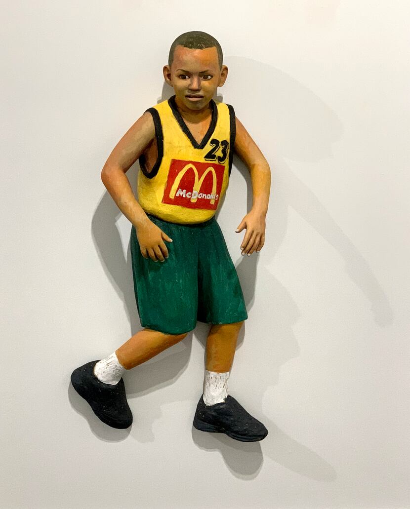 John Ahearn's 2005 work "Jhovan" features a young basketball player.