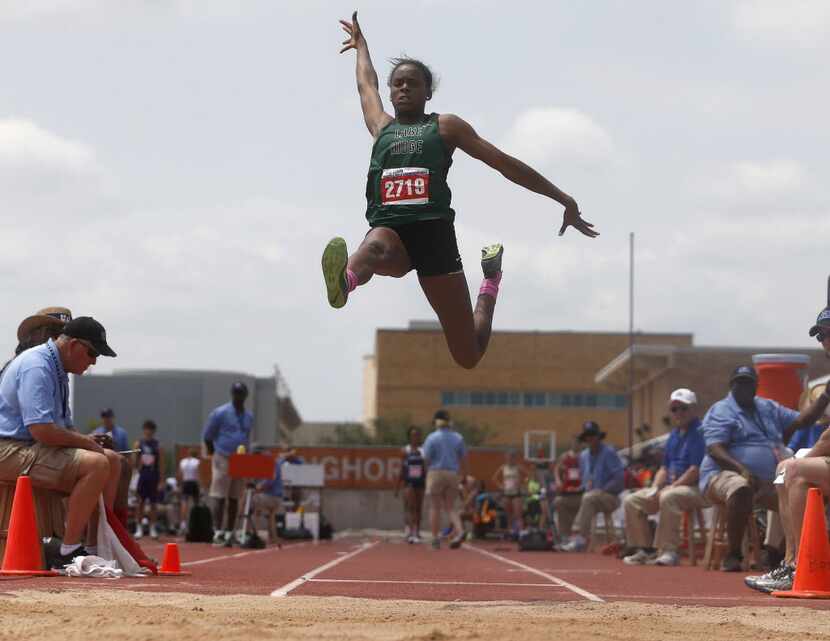 Mansfield Lake Ridge's Jasmine Moore competes in the class 5A girls long jump during the UIL...