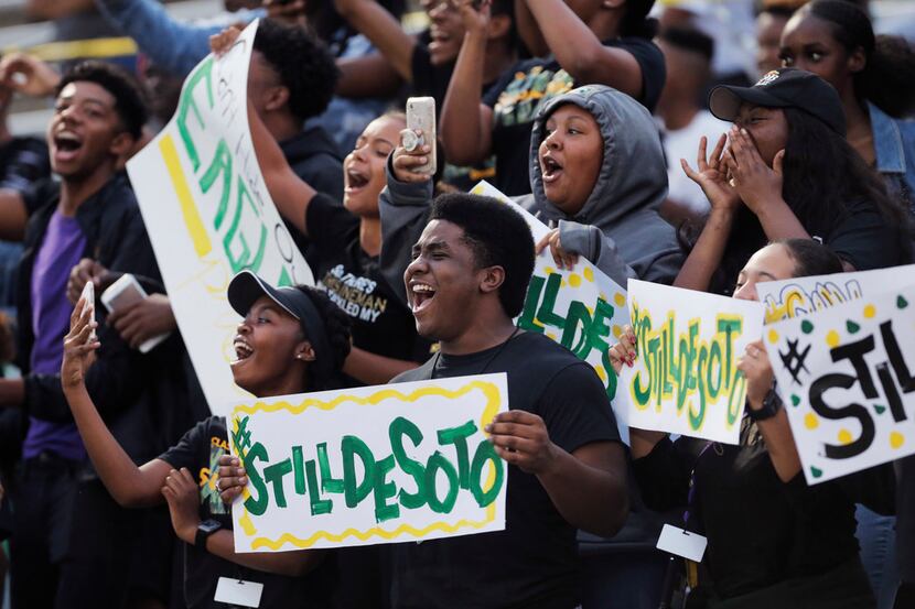 TXHSFB DeSoto fans cheer as their team takes the field before the first half of a high...