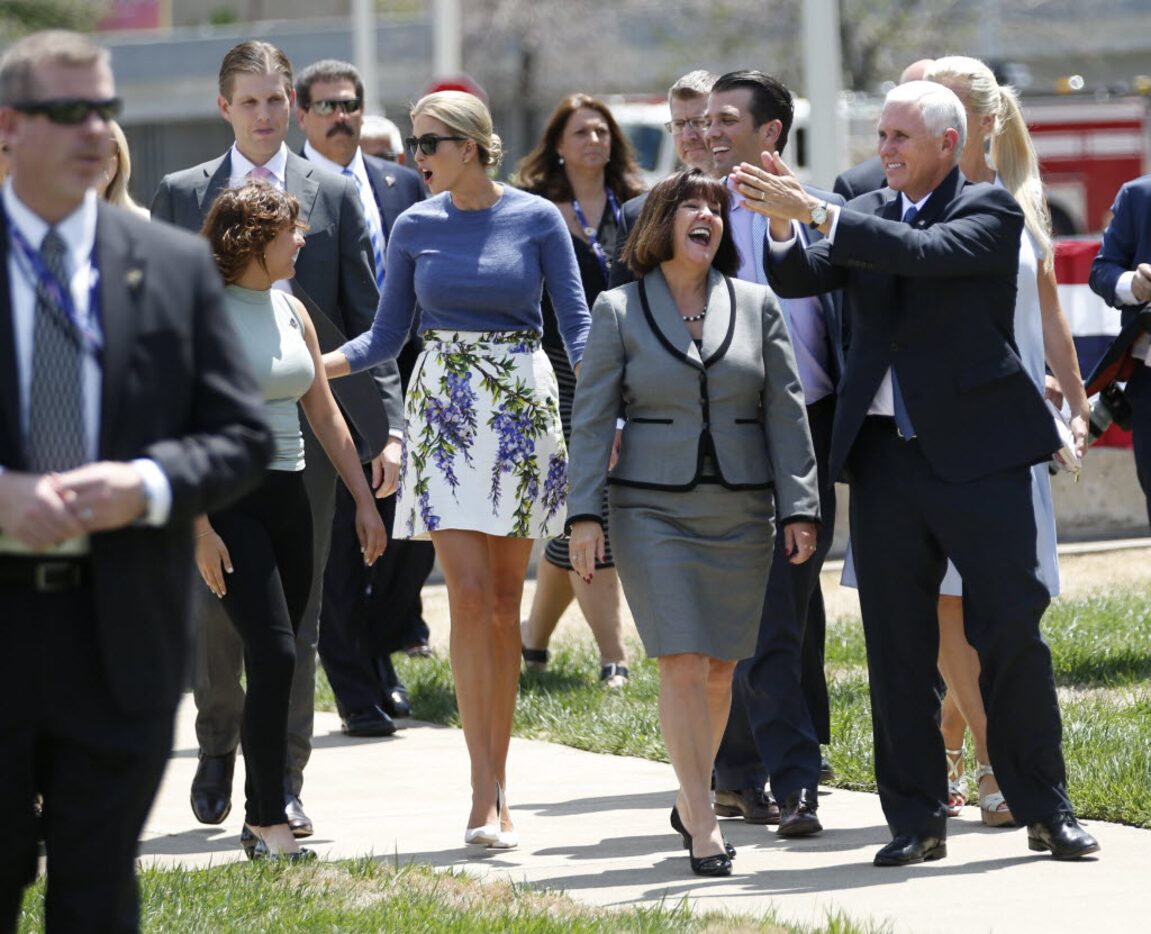 Indiana Gov. Mike Pence and wife Karen Pence greet supporters in Ohio on Wednesday. 