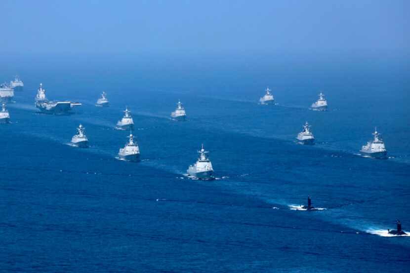 In this April 12, 2018, file photo released by China's Xinhua News Agency, the Liaoning...