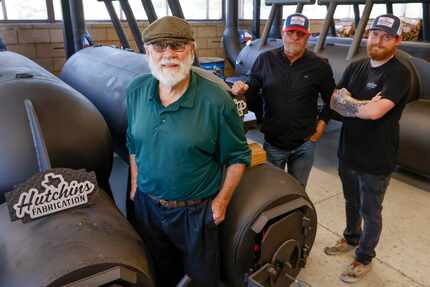 Roy Hutchins (left) stands with his eldest son Wesley Hutchins (center) and grandson Zack...