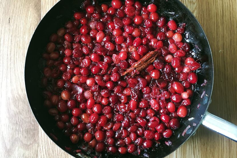 This September 2016 photo shows spiced cranberry chutney in London. This dish is from a...