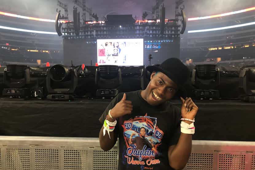 Jaylan Ford, a Taylor Swift super fan from Arlington, was gifted a signed "22" hat by Swift...