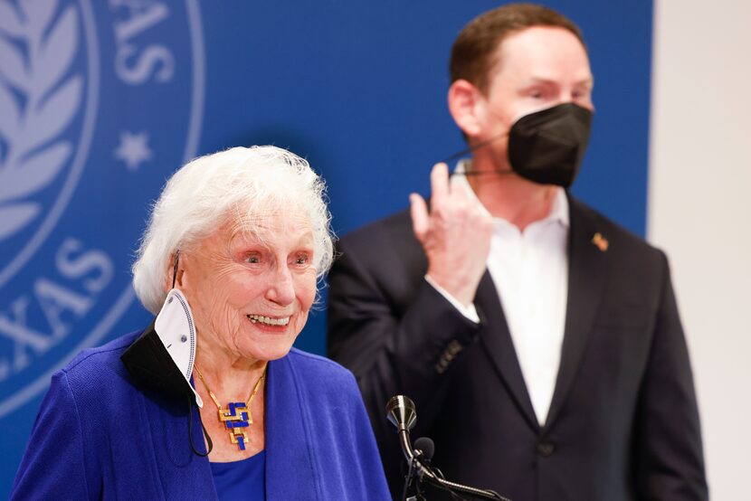 JoAnn Jenkins, 90, mother of Dallas County Judge Clay Jenkins, right, smiles as she speaks...