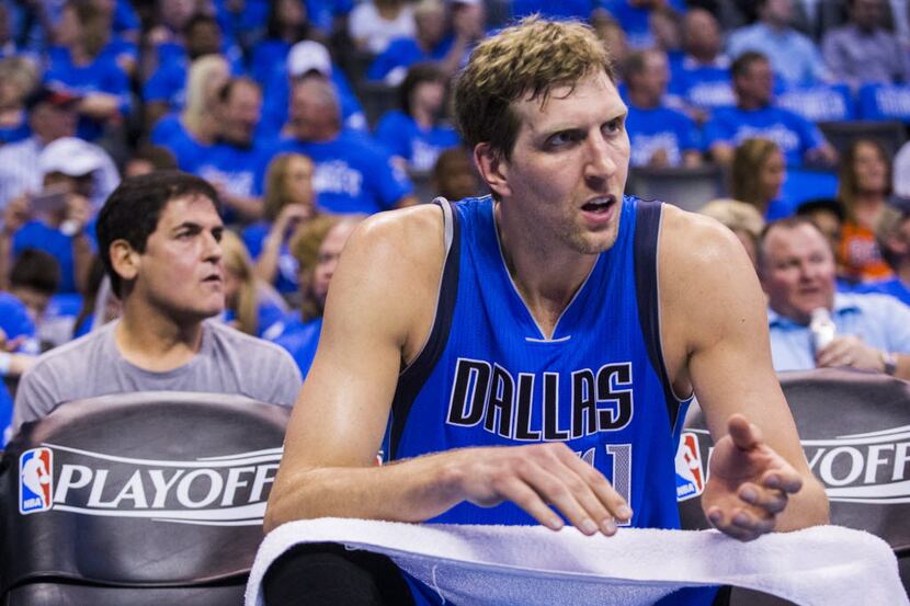 Dallas Mavericks forward Dirk Nowitzki (41) watches from the bench during the second quarter...