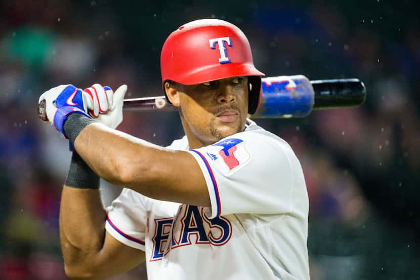 Texas Rangers third baseman Adrian Beltre (29) warms up to bat during the seventh inning of...