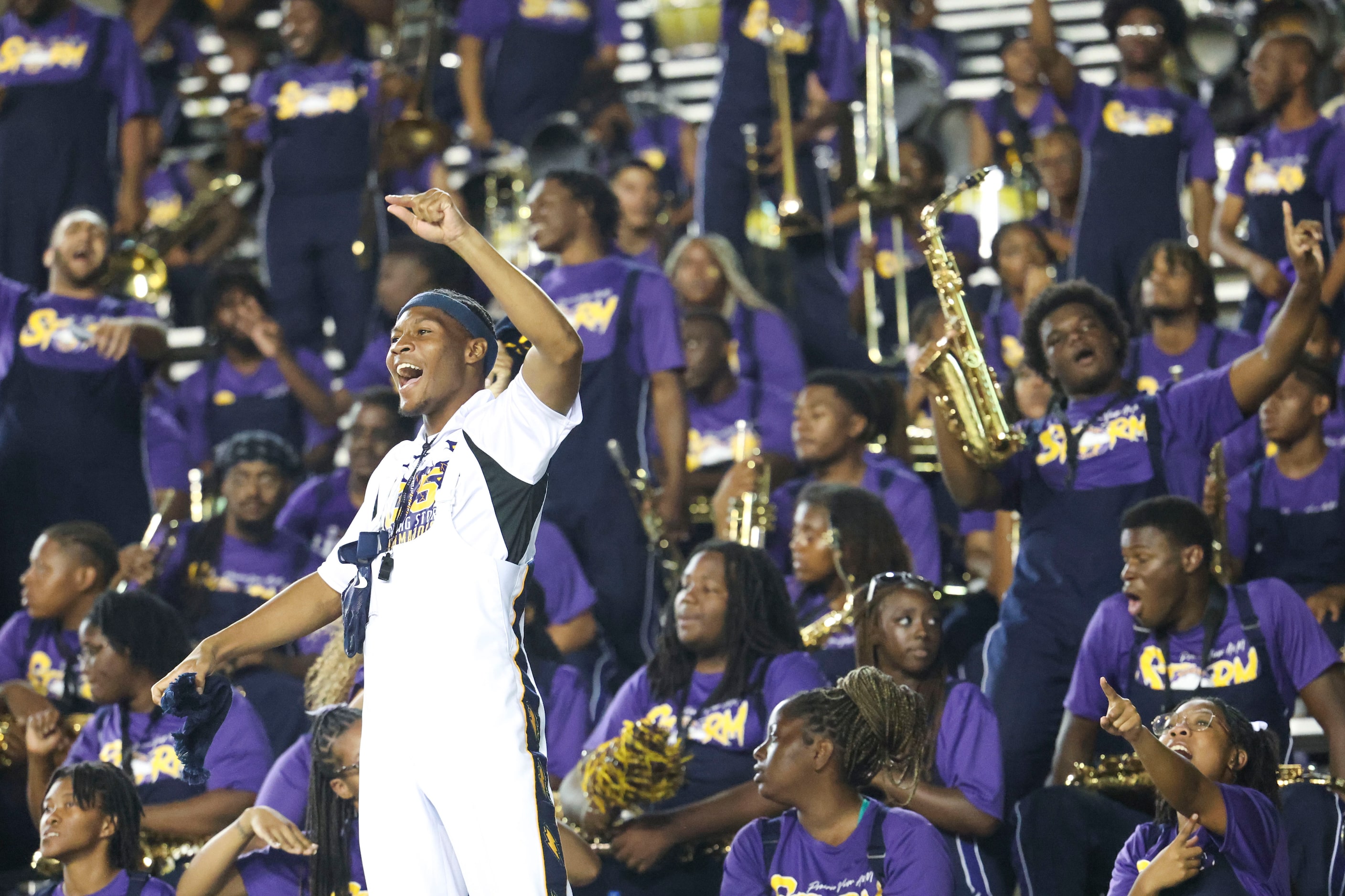 Prairie View A&M band members cheer after a touchdown during the second half of State Fair...